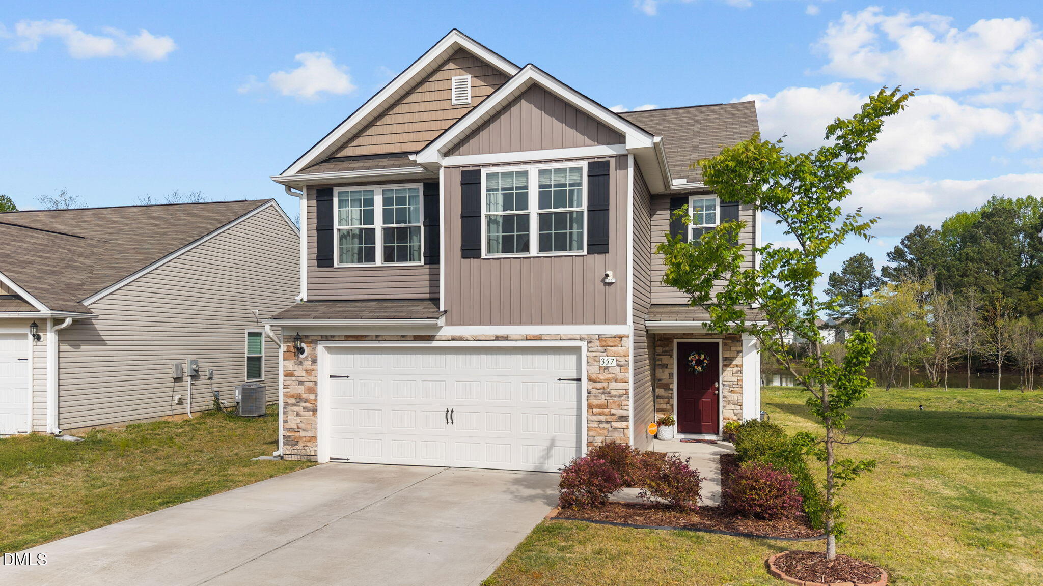 357 Gourd Street Zebulon, NC 27597 - Photo 4 of 50 front view of a house with a yard