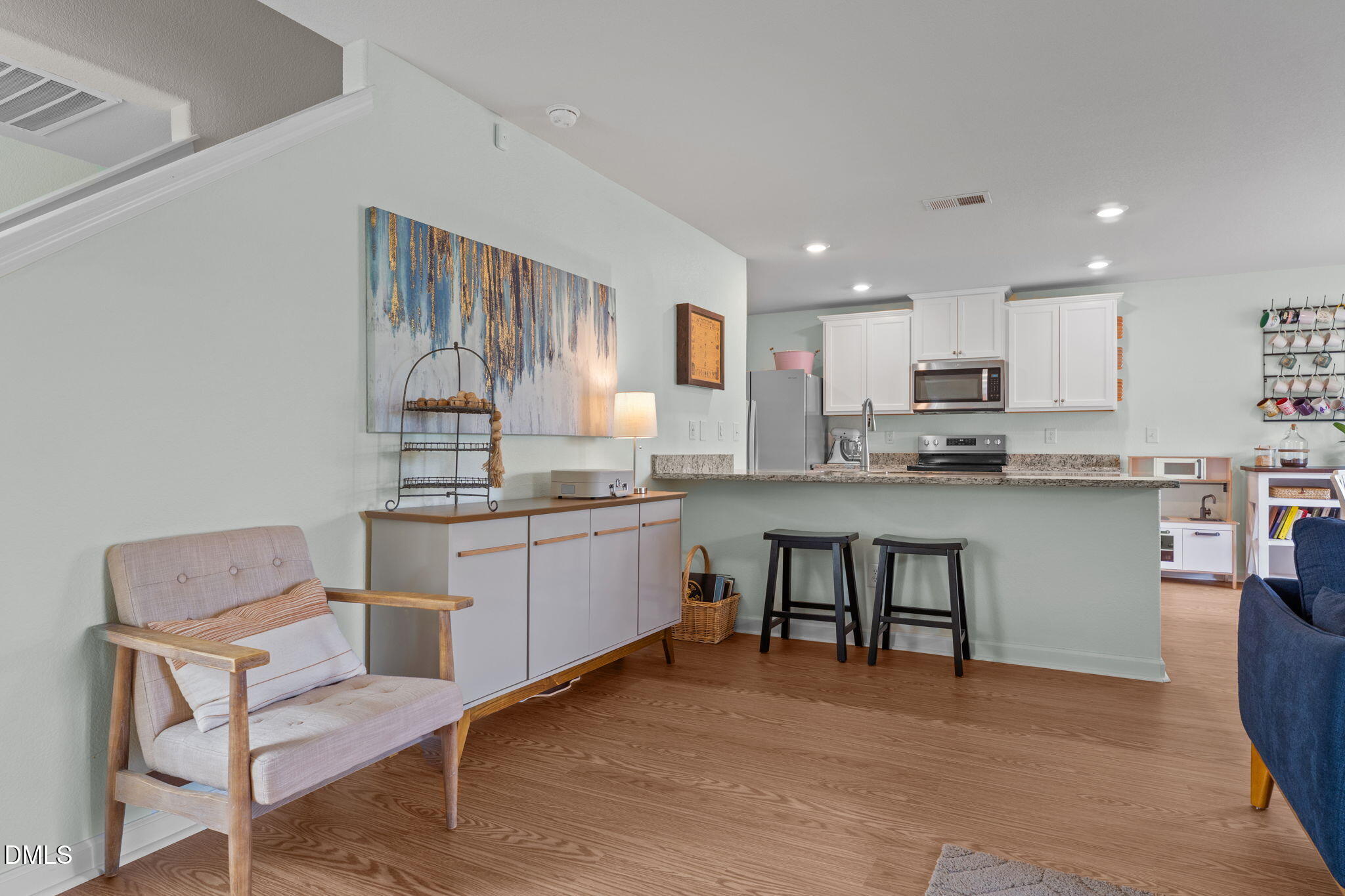 357 Gourd Street Zebulon, NC 27597 - Photo 41 of 50 a kitchen with a sink cabinets and window