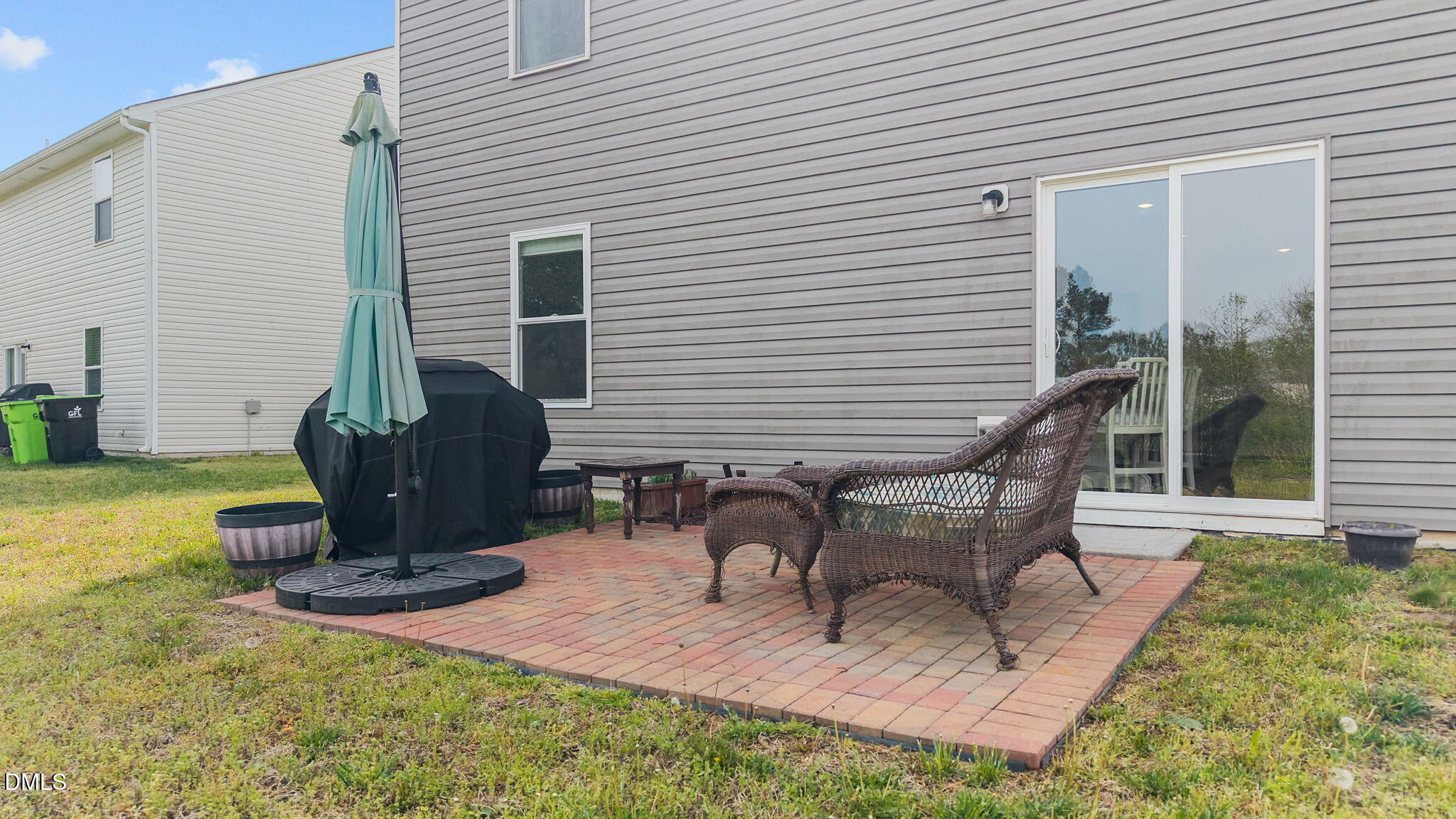 357 Gourd Street Zebulon, NC 27597 - Photo 43 of 50 a view of a patio with table and chairs