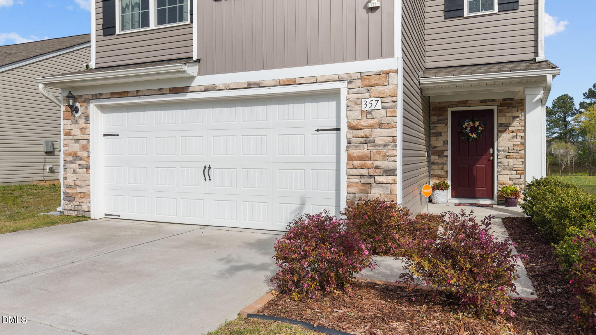 357 Gourd Street Zebulon, NC 27597 - Photo 5 of 50 a view of a house with a garage