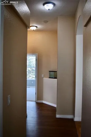 a view of a livingroom with wooden floor
