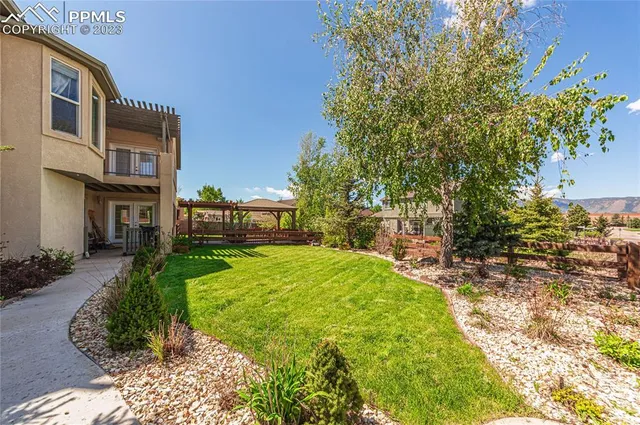 a view of a street with a building in the background