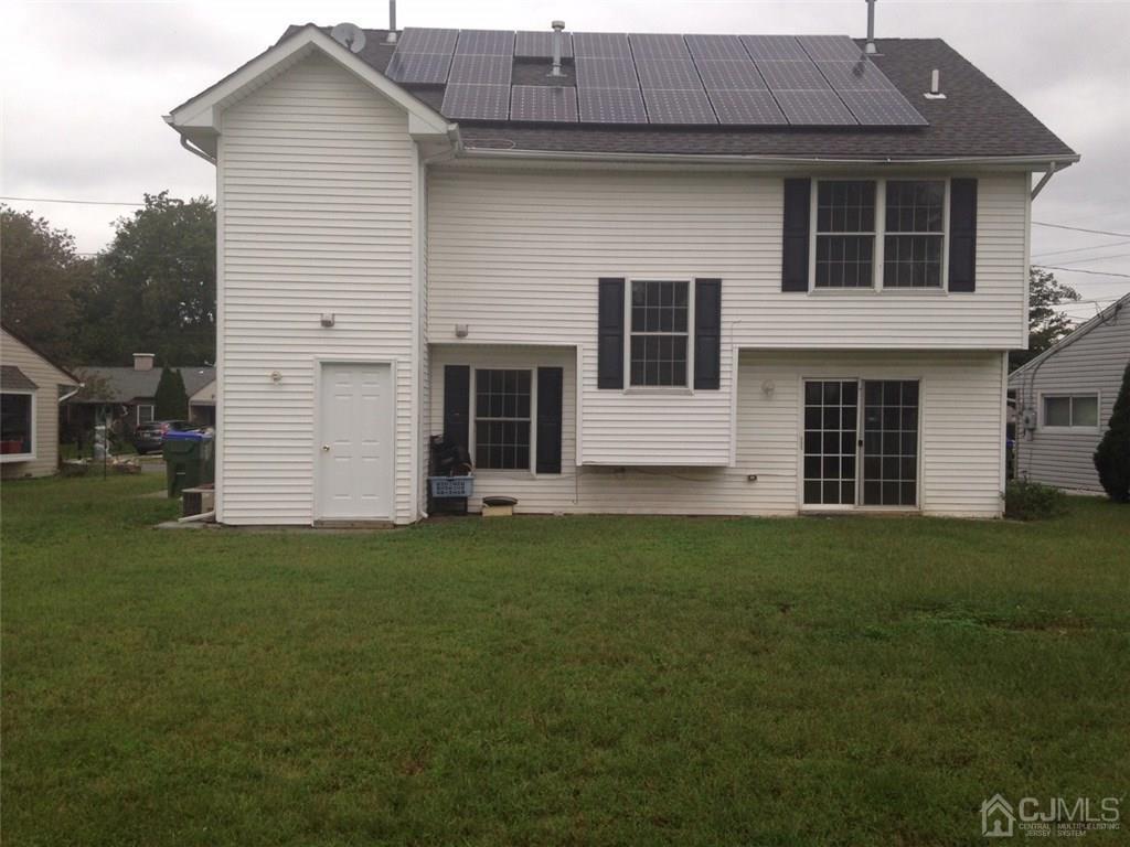 26 Baxter Road Edison, NJ 08817 - Photo 22 of 22 a front view of a house with a garden