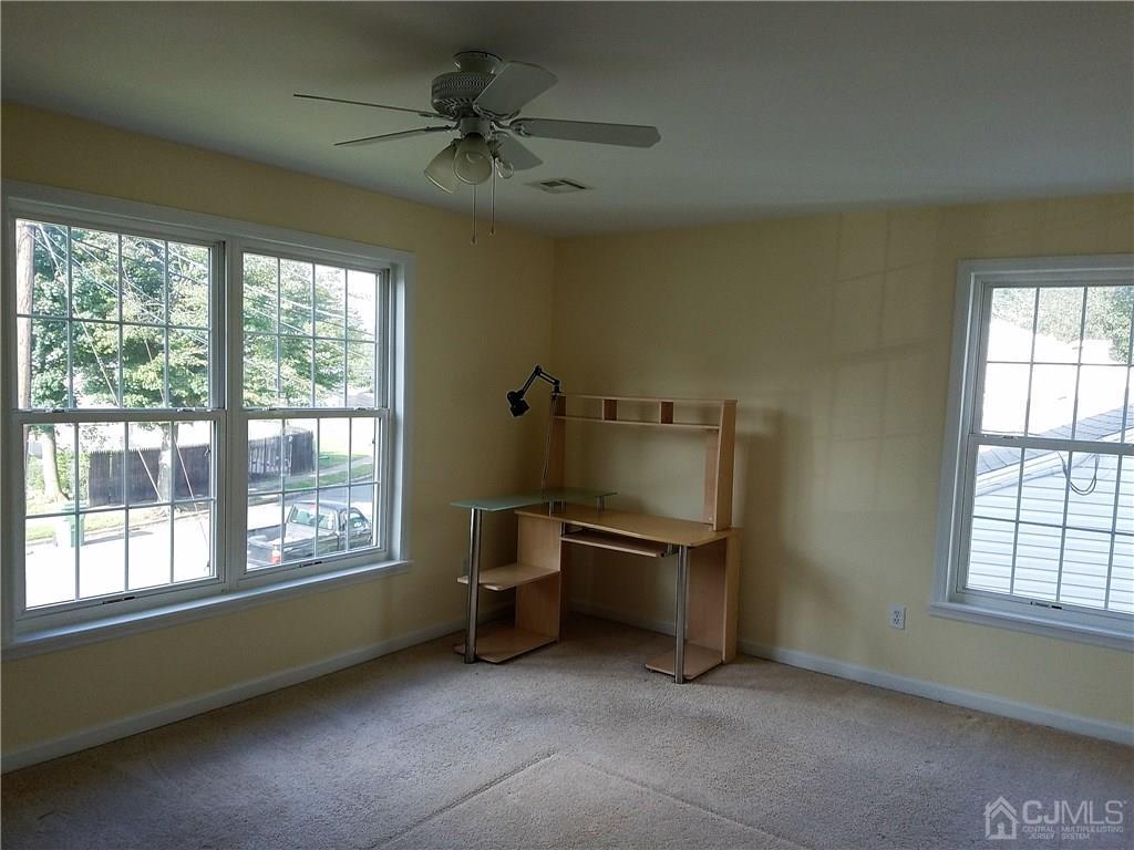 26 Baxter Road Edison, NJ 08817 - Photo 10 of 22 a view of an empty room with a window