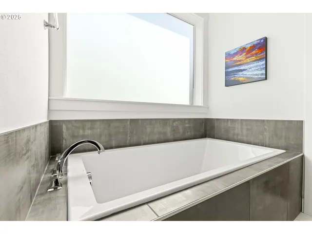 a bathroom with a bathtub