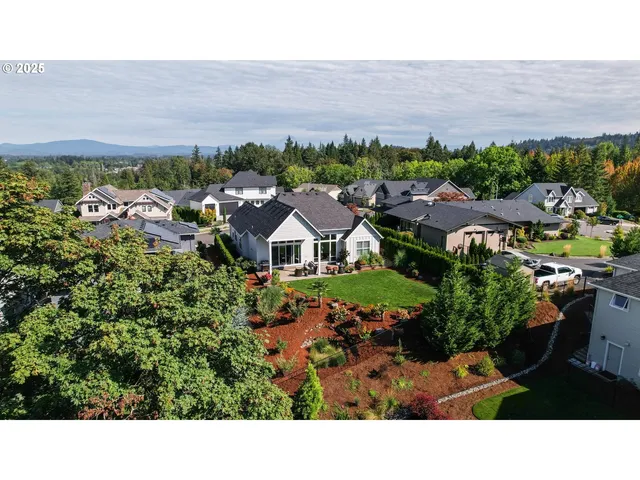 a view of a house with a garden
