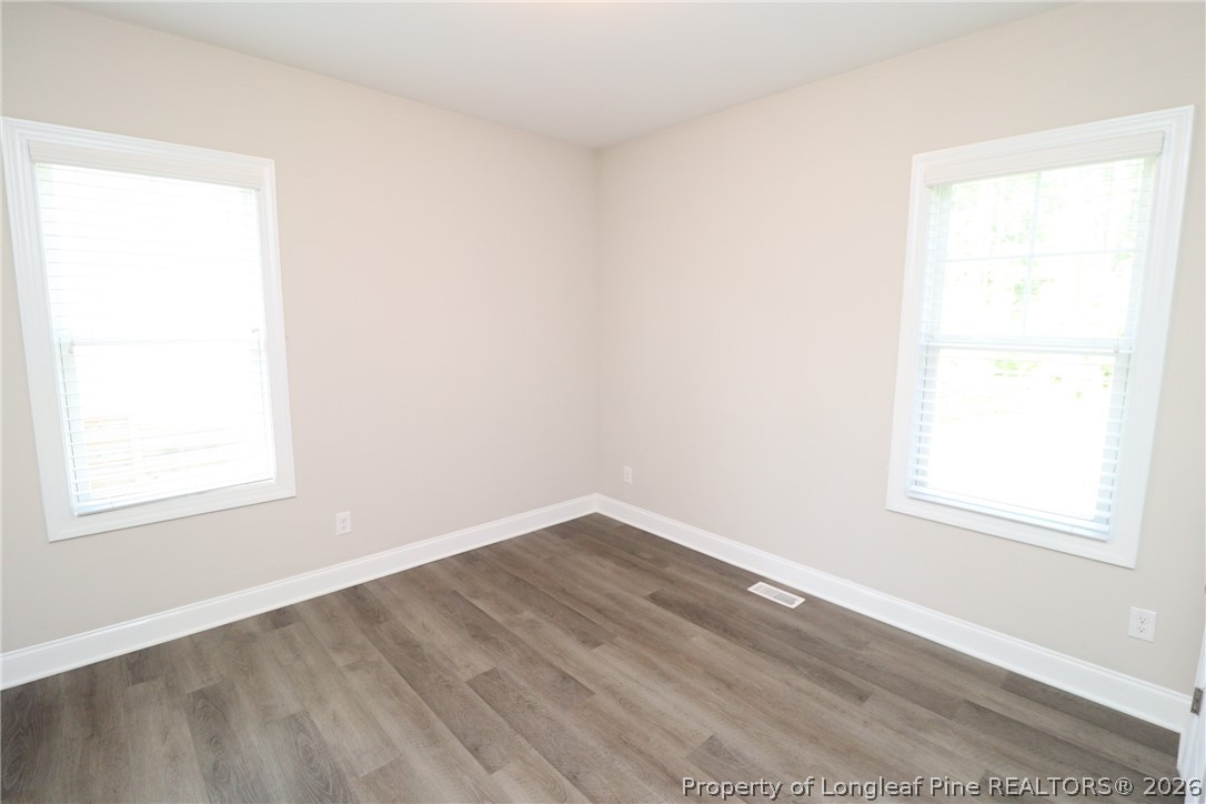 8424 Rhodes Road Apex, NC 27539 - Photo 25 of 31 an empty room with a window