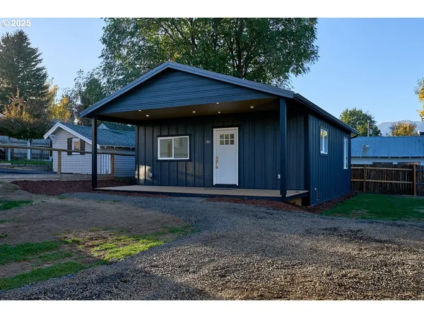 a house view with a garden space