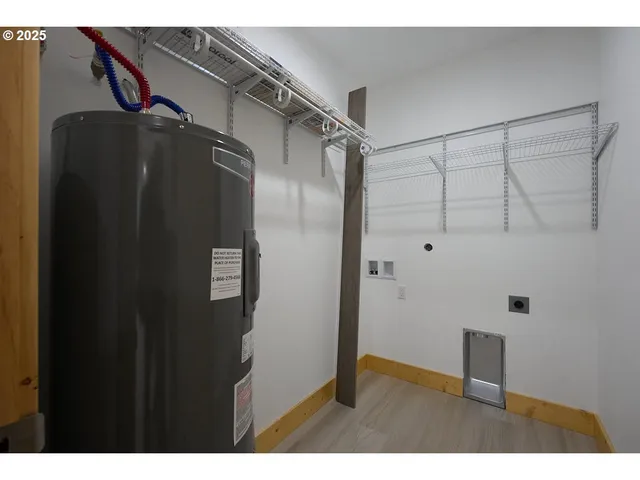 a picture of door and utility room