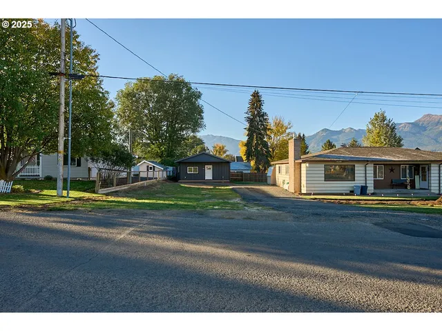 a view of street with houses