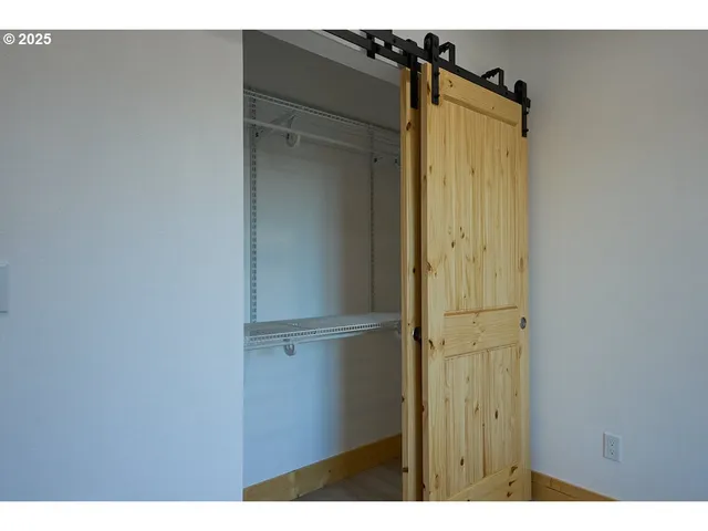 a view of cabinet with front door