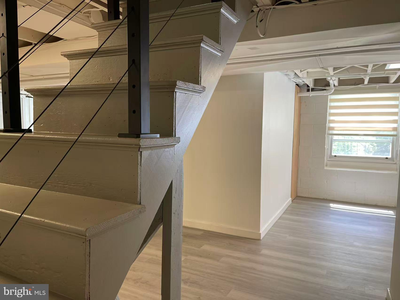 1019 Howellville Road Berwyn, PA 19312 - Photo 28 of 28 Bright, airy space with modern stairs.