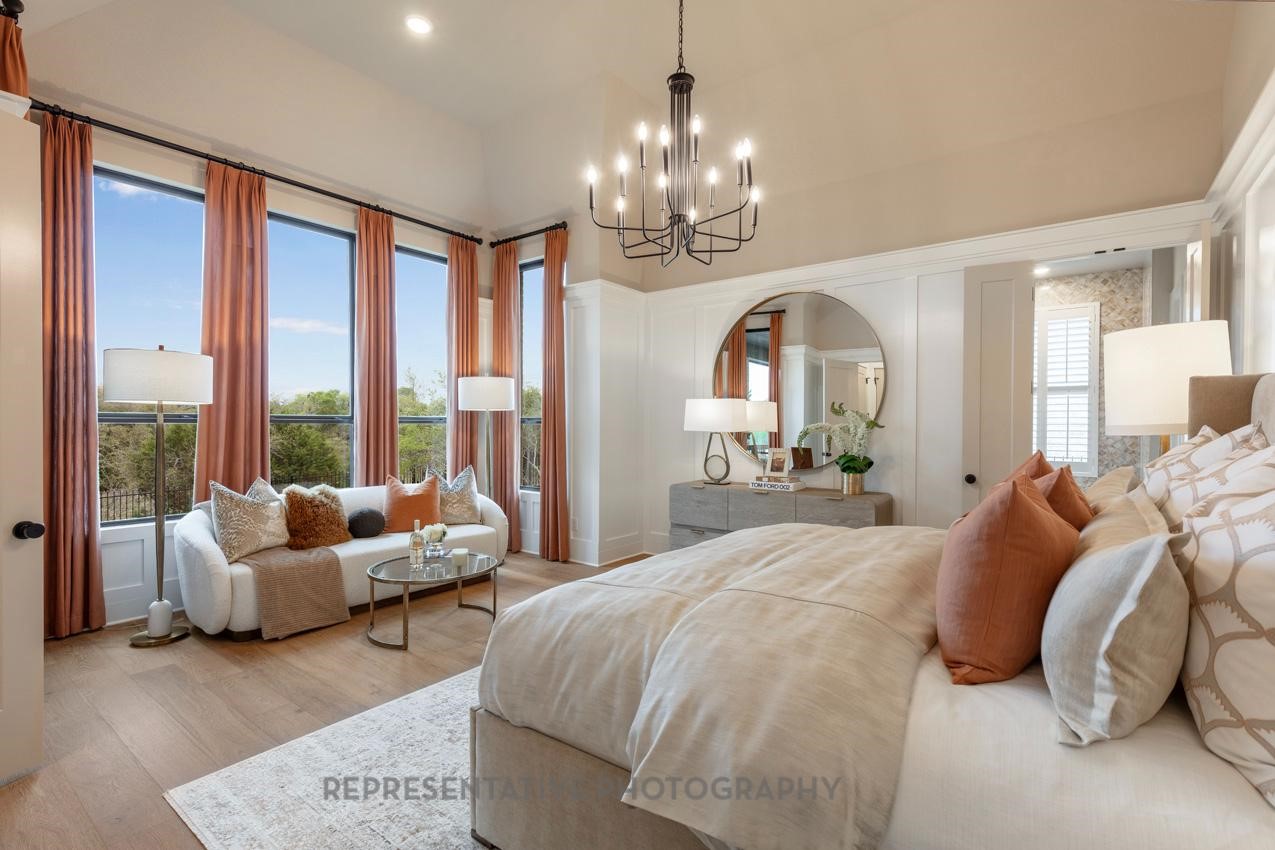 8911 Blue Grotto Lane Manvel, TX 77578 - Photo 12 of 34 a spacious bedroom with bed and a large window