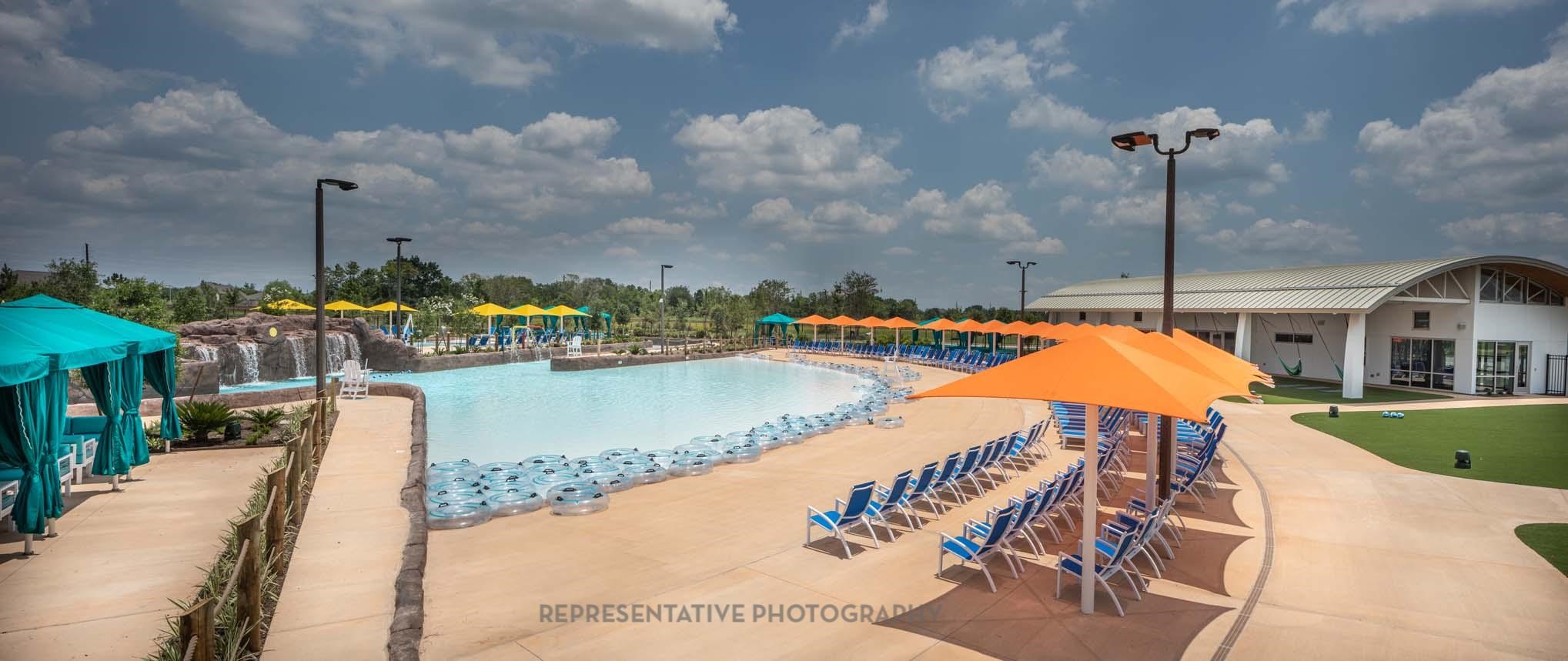 8911 Blue Grotto Lane Manvel, TX 77578 - Photo 32 of 34 a view of a swimming pool with a patio