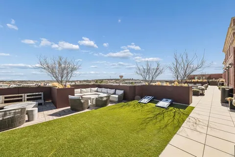 a view of a terrace with seating space