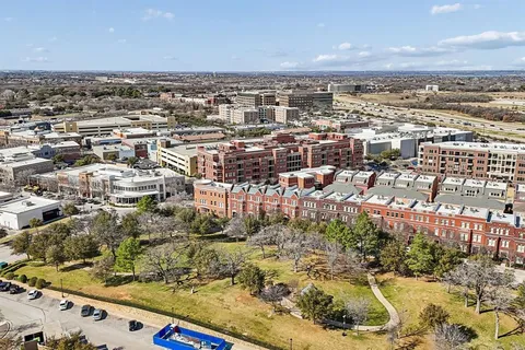 a building with streets and trees