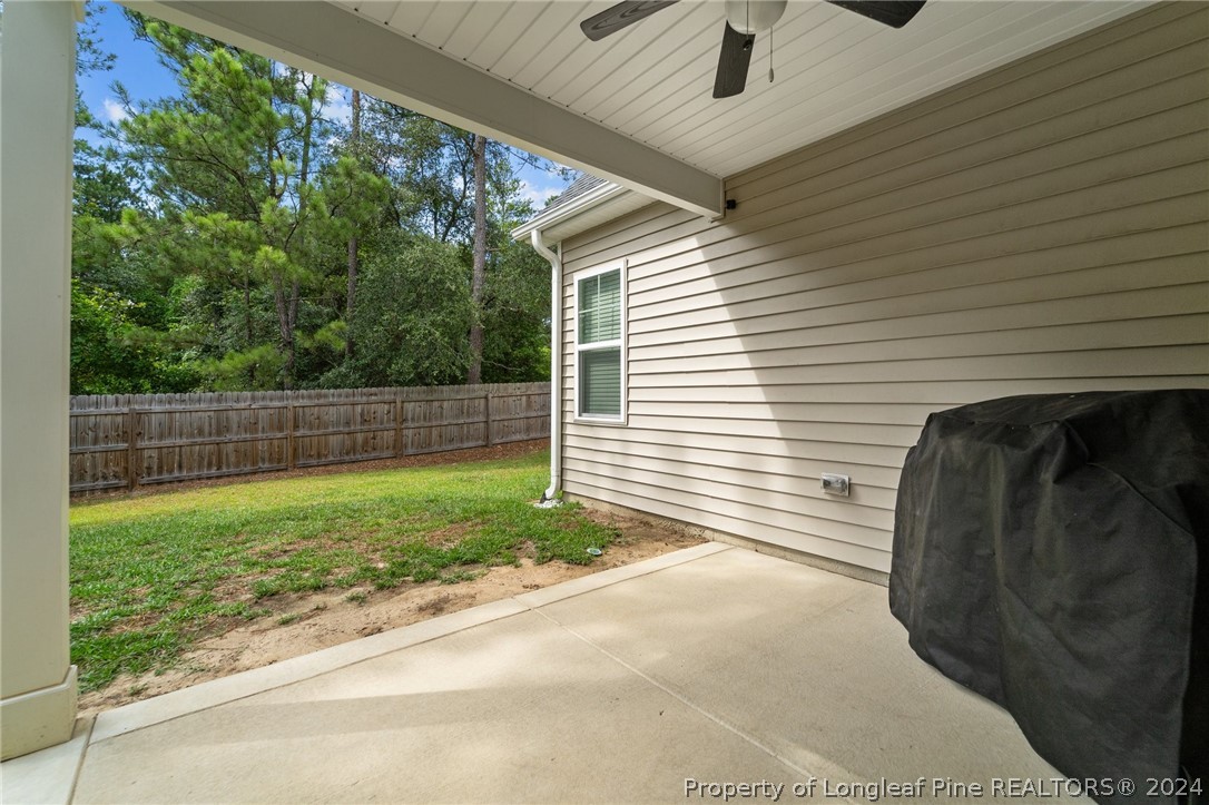 186 Sandy Springs Road Aberdeen, NC 28315 - Photo 33 of 46 a view of backyard with green space