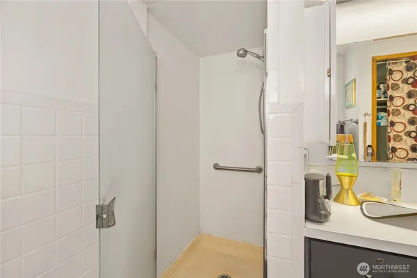 a bathroom with a sink and a mirror