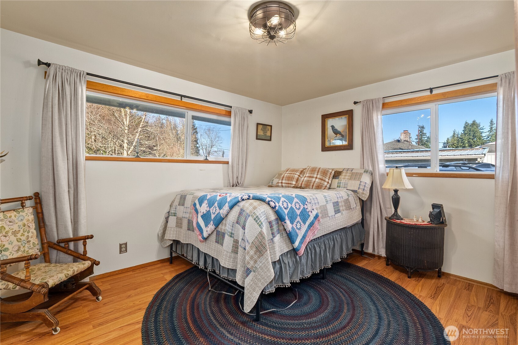631 5th Avenue Forks, WA 98331 - Photo 21 of 40 a bedroom with a bed and glass window