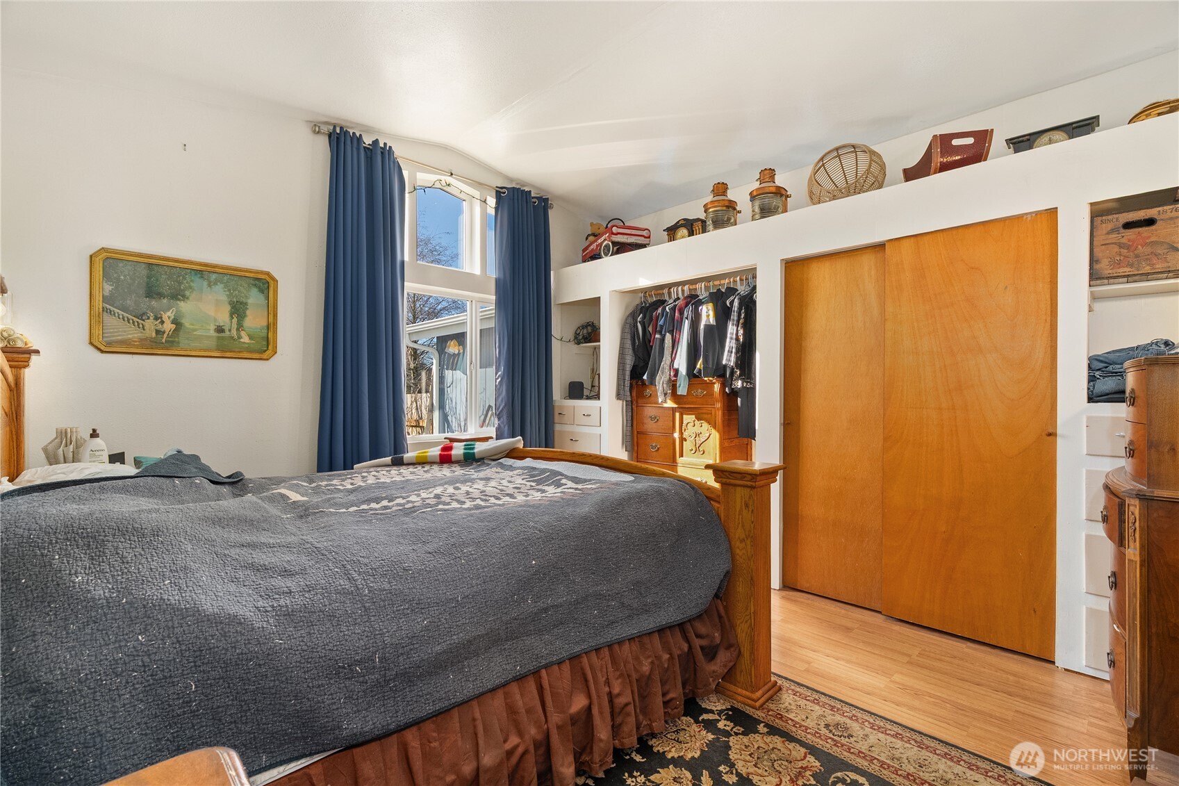 631 5th Avenue Forks, WA 98331 - Photo 26 of 40 a bed sitting in a bedroom next to a window