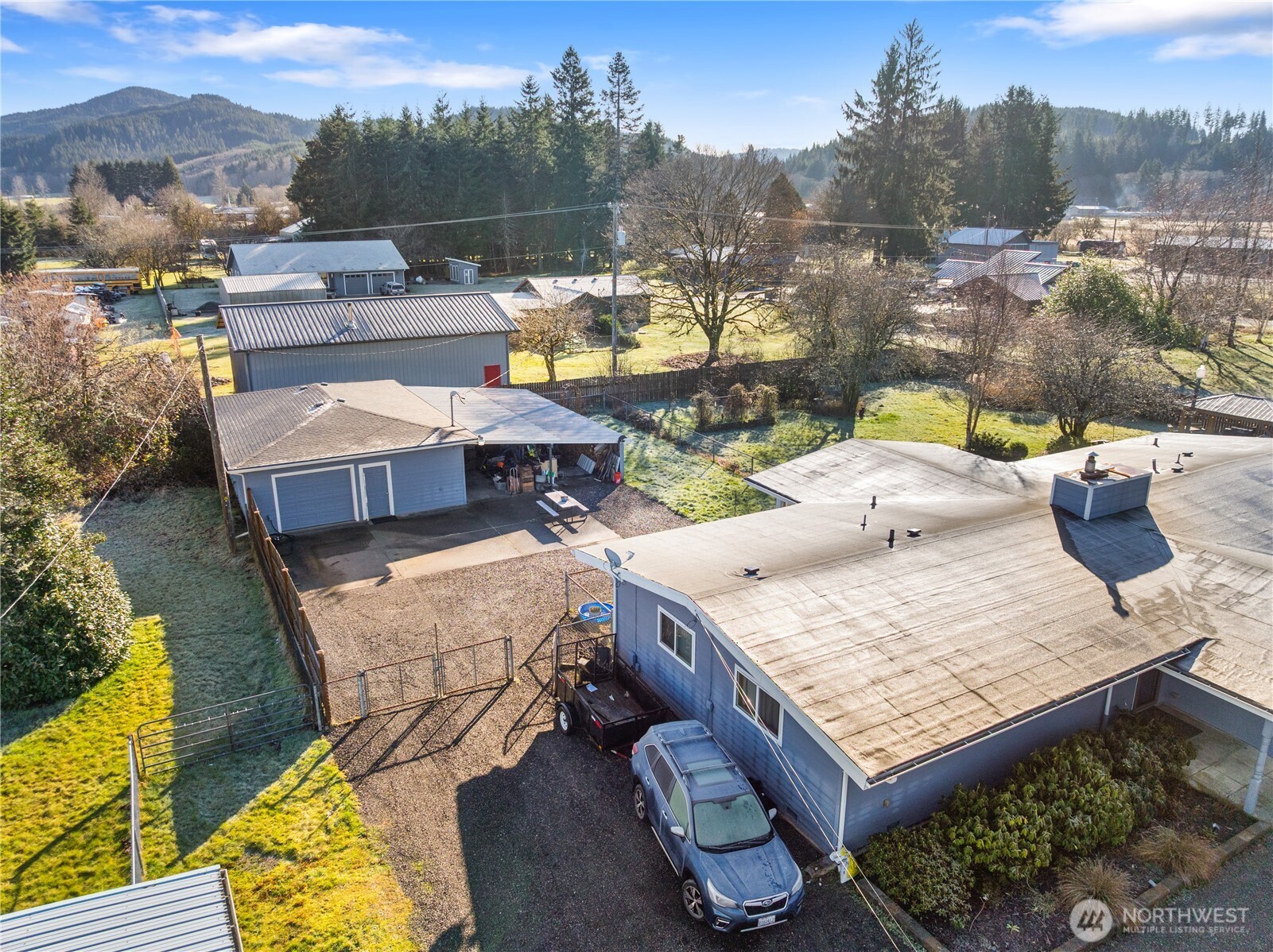 631 5th Avenue Forks, WA 98331 - Photo 36 of 40 a view of a terrace with furniture and a garden