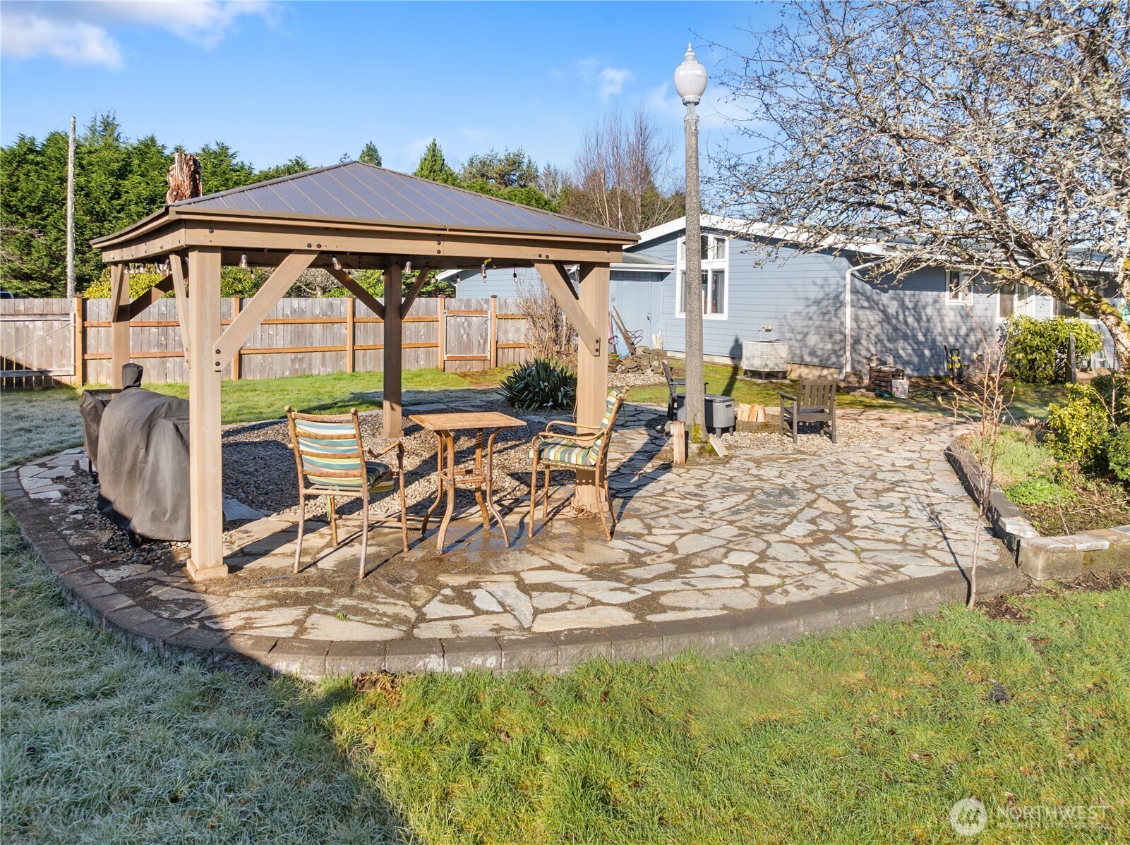 631 5th Avenue Forks, WA 98331 - Photo 39 of 40 a view of a swimming pool with a patio