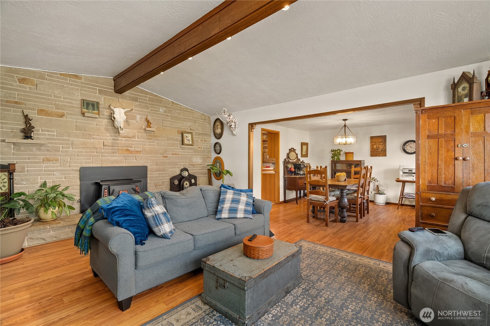 631 5th Avenue Forks, WA 98331 - Photo 6 of 40 a living room with furniture and a fireplace
