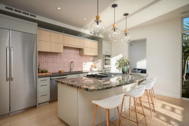 a kitchen that has a cabinets counter space and appliances