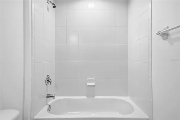 a view of a room that has a window in it