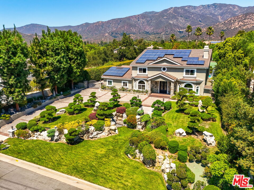 1047 East Pomello Drive Claremont, CA 91711 - Photo 11 of 73 a aerial view of a house with a garden