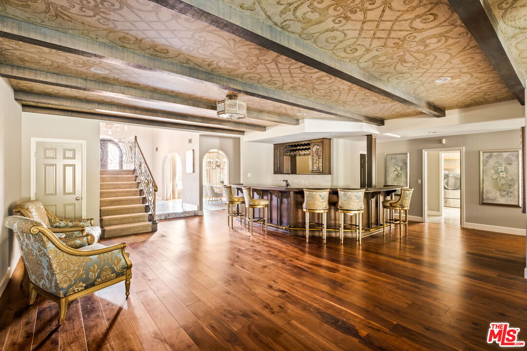 1047 East Pomello Drive Claremont, CA 91711 - Photo 16 of 73 a dining room with furniture entryway and wooden floor