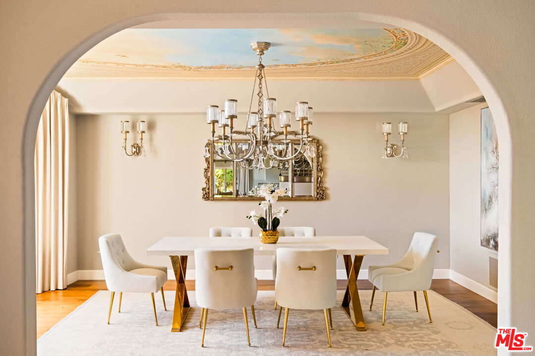 1047 East Pomello Drive Claremont, CA 91711 - Photo 25 of 73 a view of a dining room with furniture and wooden floor