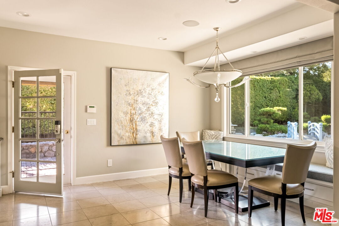 1047 East Pomello Drive Claremont, CA 91711 - Photo 33 of 73 a dining room with furniture window and outside view