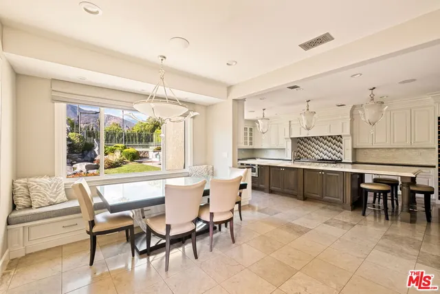 a spacious bathroom with a bathtub and next to a window