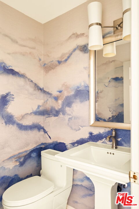 1047 East Pomello Drive Claremont, CA 91711 - Photo 41 of 73 a bathroom with a sink and a toilet