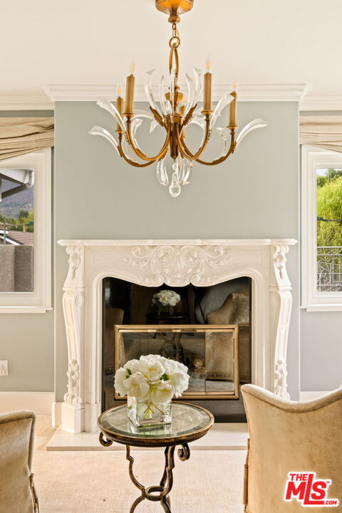 1047 East Pomello Drive Claremont, CA 91711 - Photo 45 of 73 a living room with furniture and a fireplace