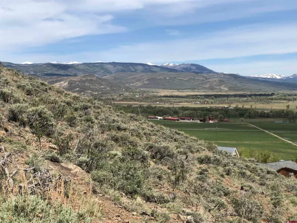 a view of a lake with a mountain in the background