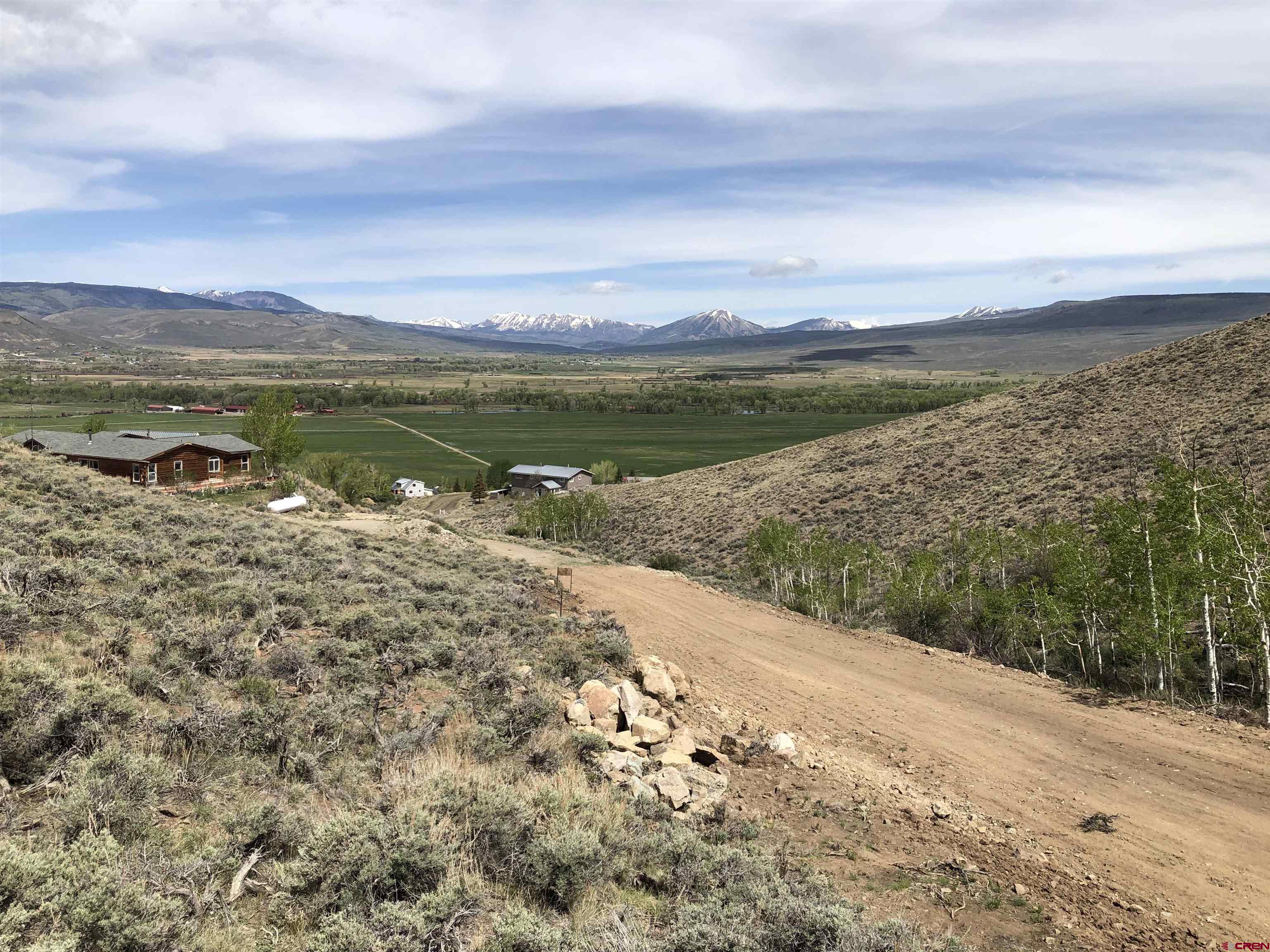 405 Sequoia Drive Gunnison, CO 81230 - Photo 21 of 26 a view of a lake with a mountain