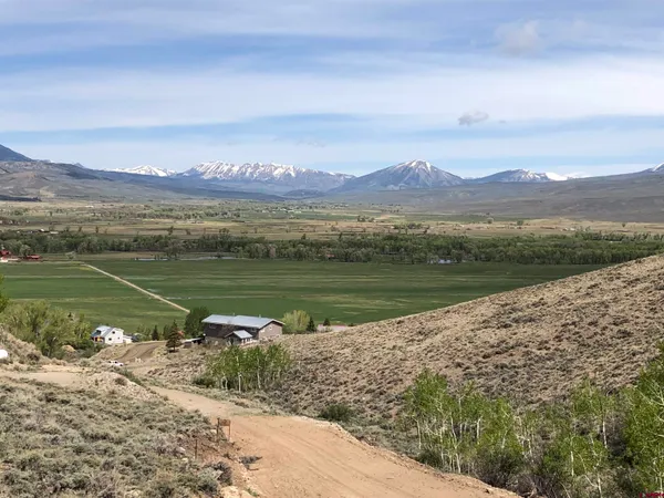 a view of a lake with a city