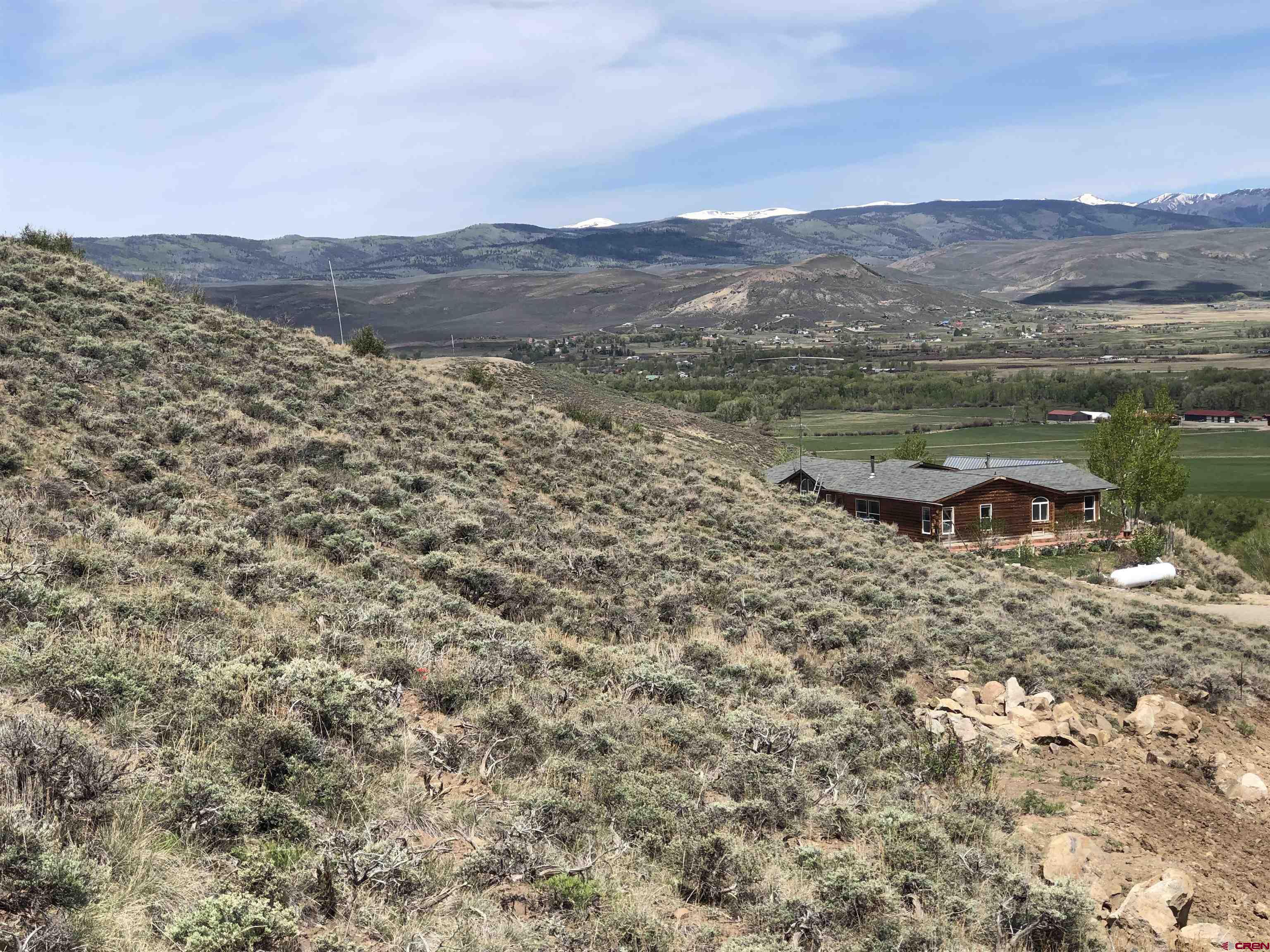 405 Sequoia Drive Gunnison, CO 81230 - Photo 8 of 26 a view of a town with mountains in the background