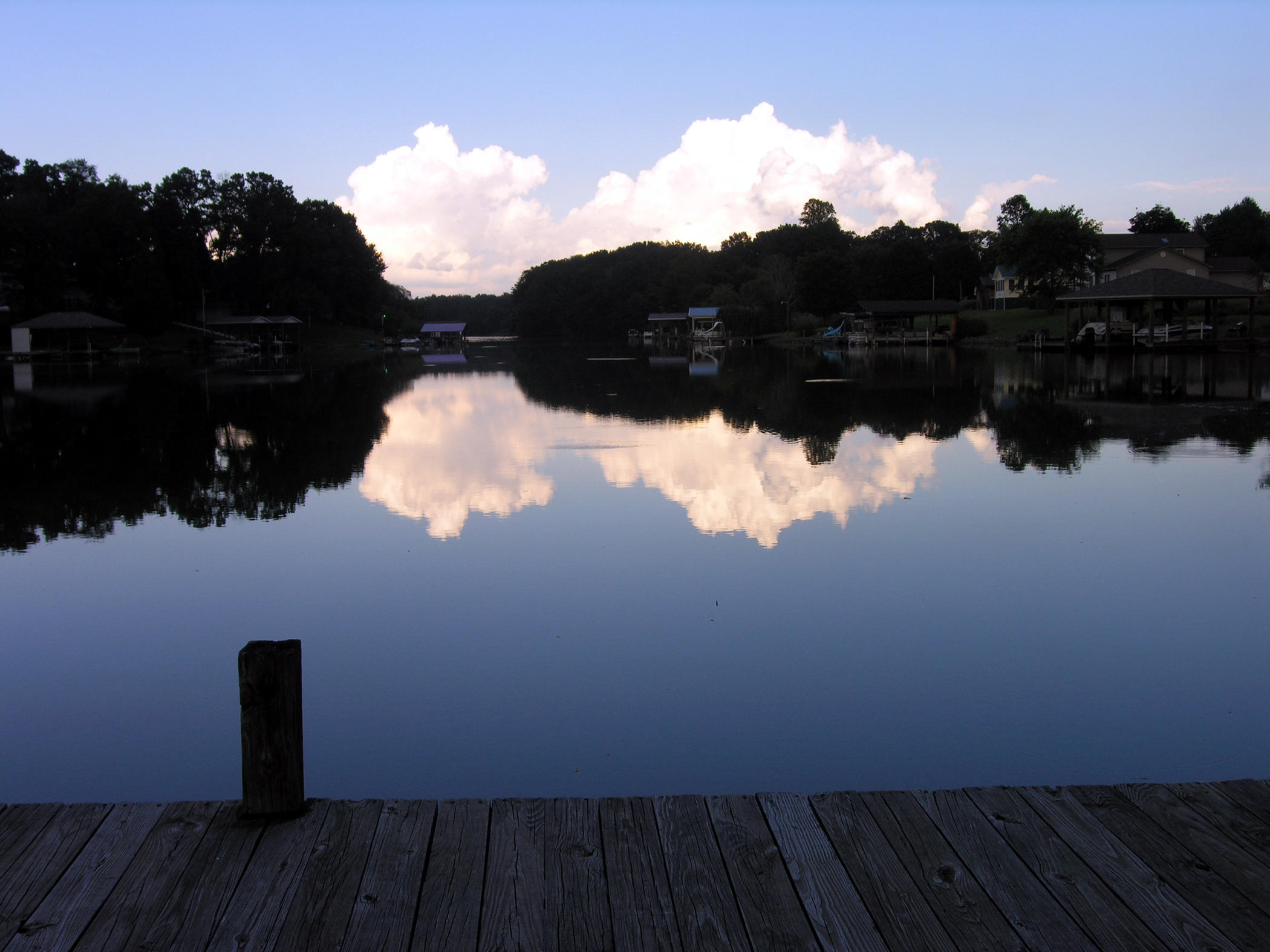 725 Corntassel Road Vonore, TN 37885 - Photo 5 of 12 White clouds reflection from the dock