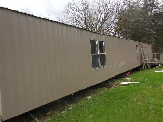 a backyard of a house with lots of green space