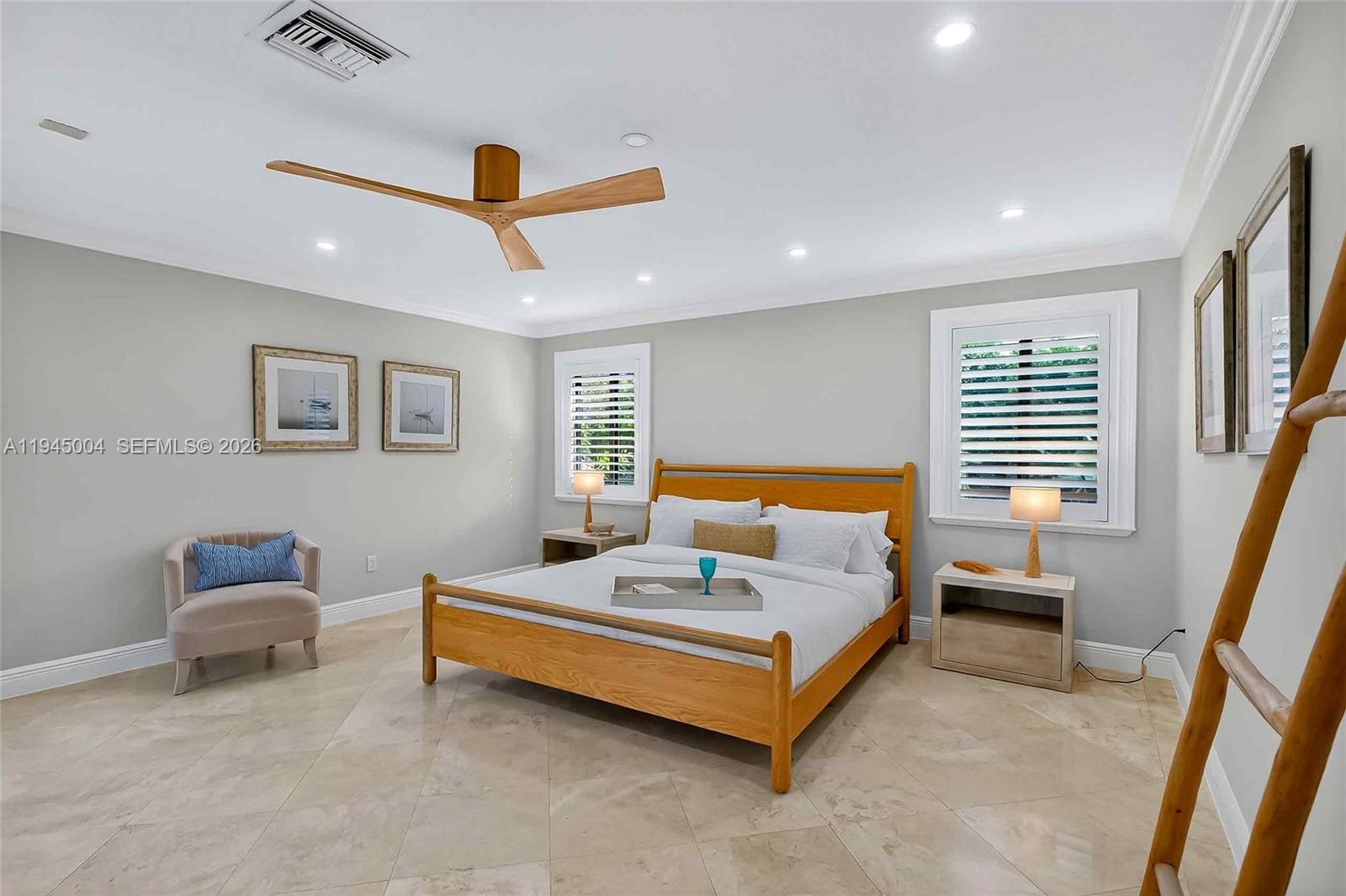 13945 North Cartee Road Palmetto Bay, FL 33158 - Photo 14 of 29 a bedroom with furniture and a window