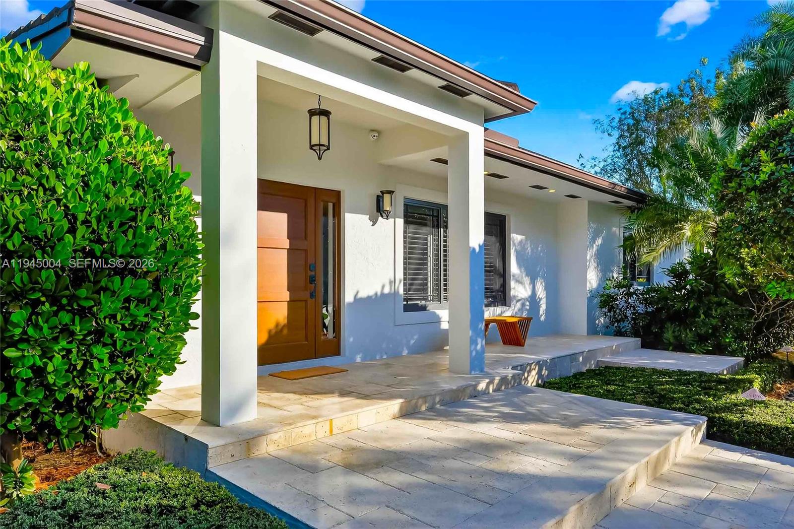13945 North Cartee Road Palmetto Bay, FL 33158 - Photo 29 of 29 a front view of a house with a yard