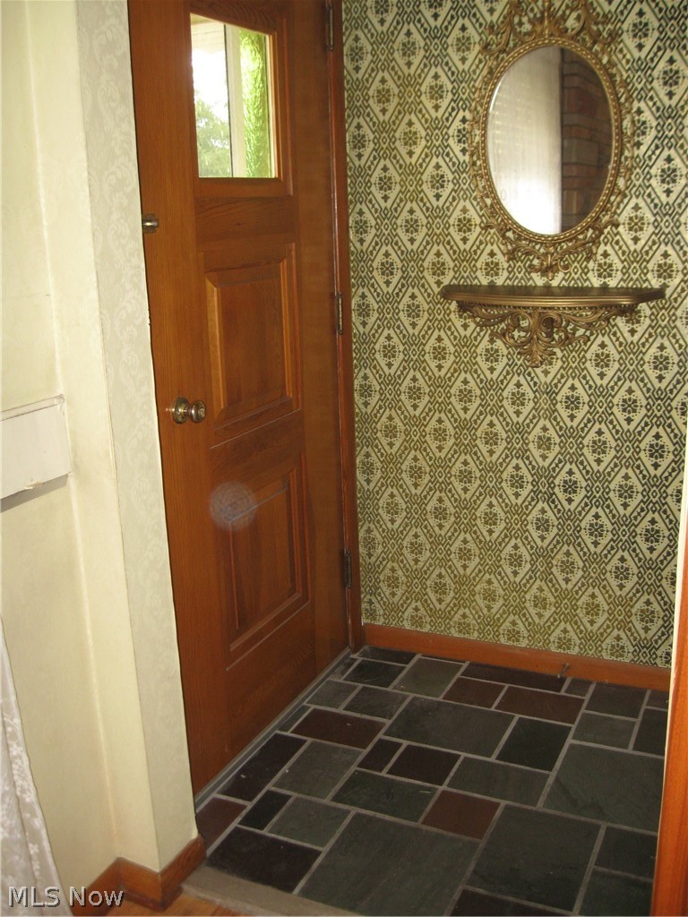 6154 State Road Parma, OH 44134 - Photo 28 of 35 Front door entryway with authentic, slate floor and coat closet to right (not visible).
