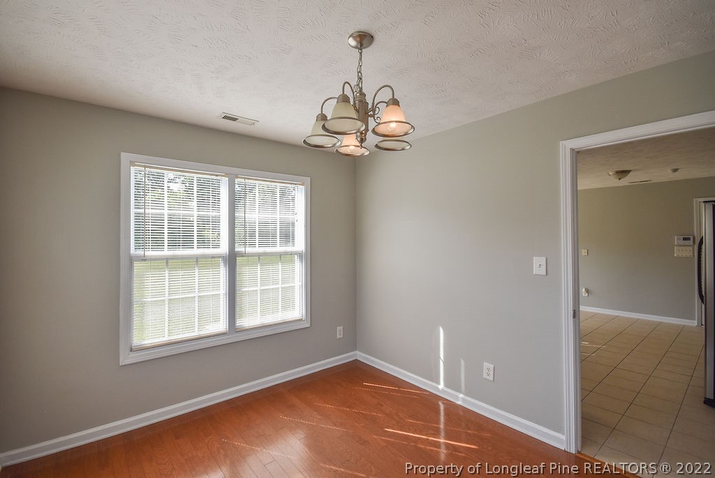 6700 Valley Falls Road Hope Mills, NC 28348 - Photo 19 of 48 a view of an empty room with a window