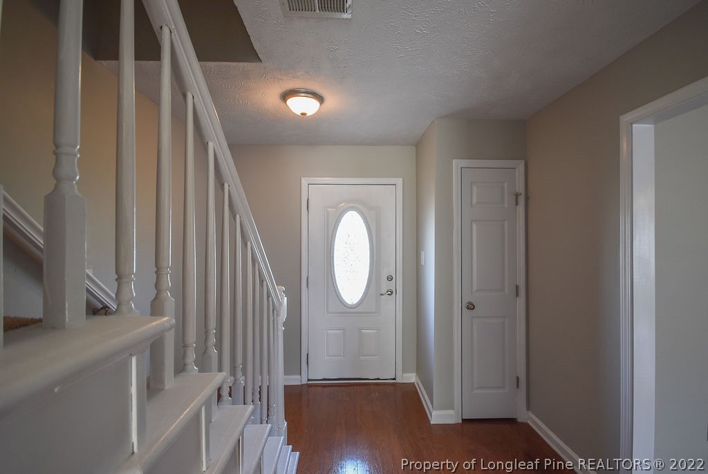 6700 Valley Falls Road Hope Mills, NC 28348 - Photo 23 of 48 a view of entryway with wooden floor