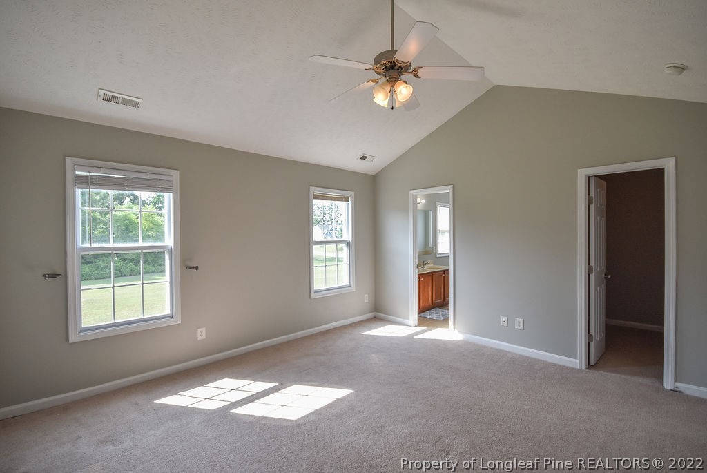 6700 Valley Falls Road Hope Mills, NC 28348 - Photo 26 of 48 an empty room with windows and fan