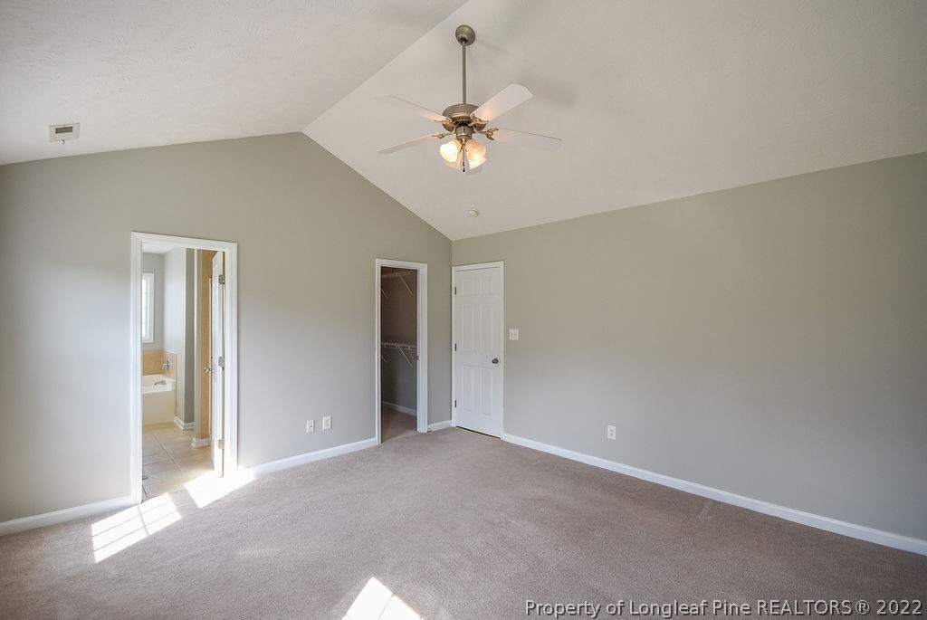 6700 Valley Falls Road Hope Mills, NC 28348 - Photo 27 of 48 a view of a livingroom with a ceiling fan