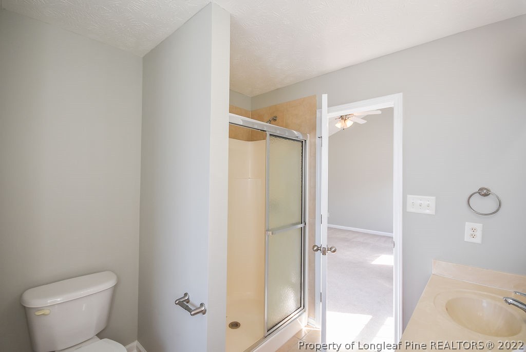 6700 Valley Falls Road Hope Mills, NC 28348 - Photo 31 of 48 a bathroom with a shower and toilet